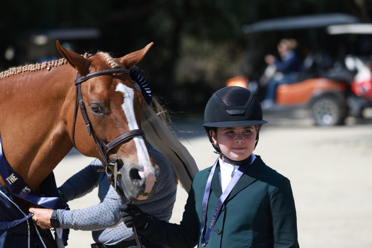 Kate after winning the Short Stirrup Hunter 2' Classic at The Oaks Summer 2, 2026